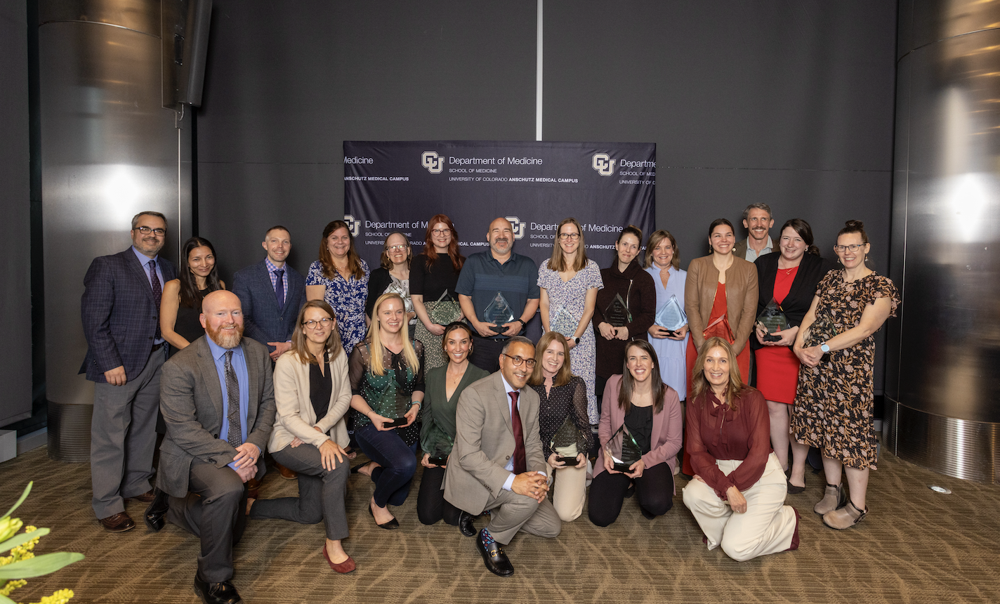 group of people with an award