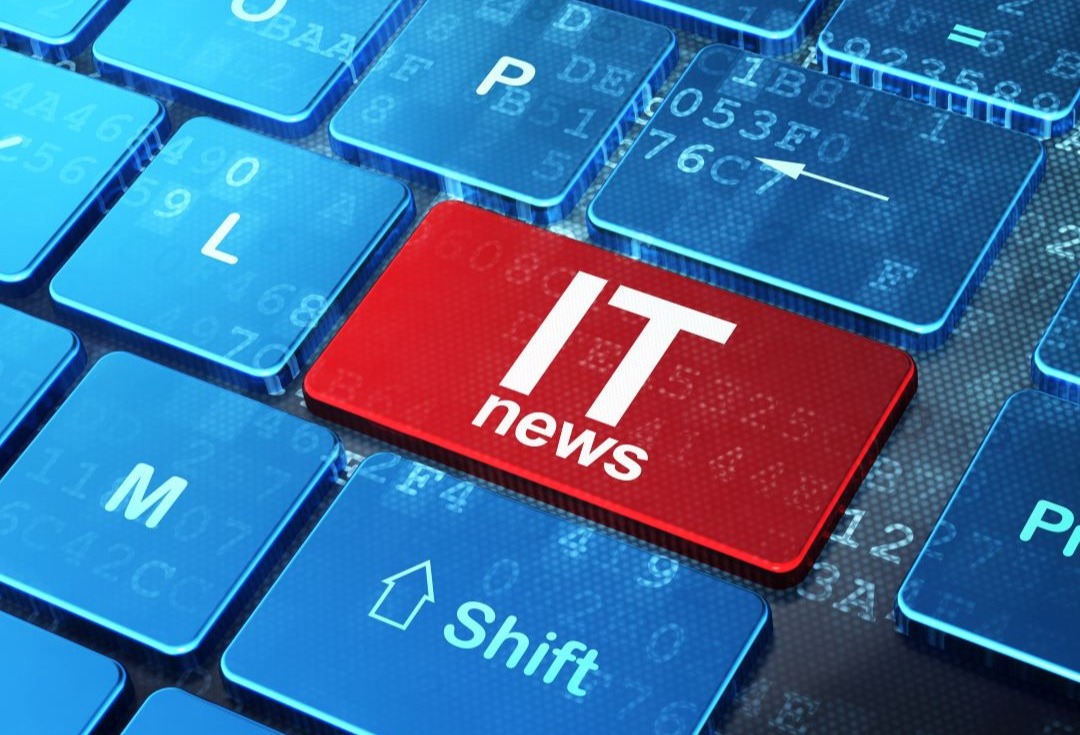 Keyboard with IT News written on a key.