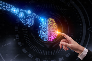 Robot and human hand connecting to a brain