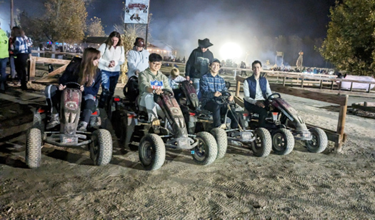mstp drag race 24 students on atvs lined up to race