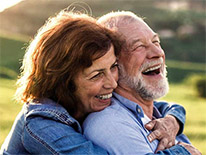 Older couple hugging