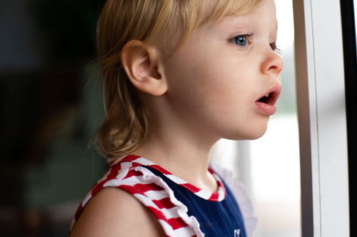 child looking out