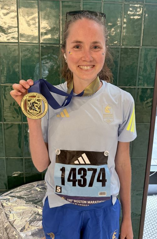 Olivia Anderson and her Boston Marathon medal