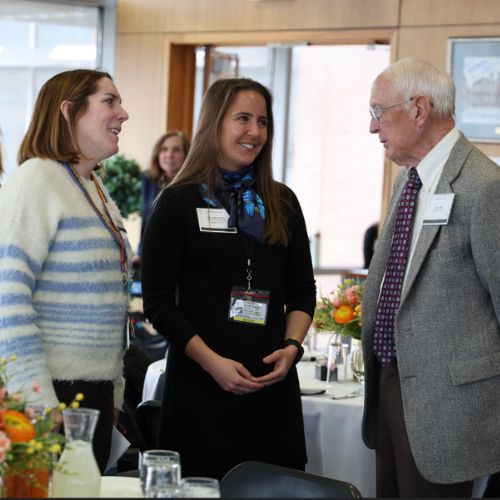 David Elm class of 1976 chats with Chandler Follett, class of 2016 and Cindy O'Bryant