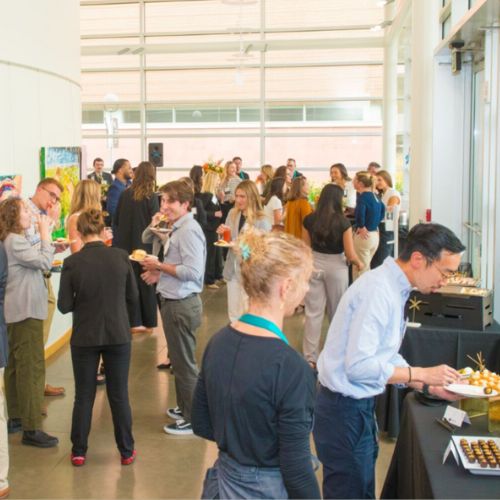 Guests enjoying food, beverages, art and conversation during the 2025 Power of Philanthropy celebration.