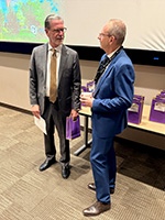 Two men talking