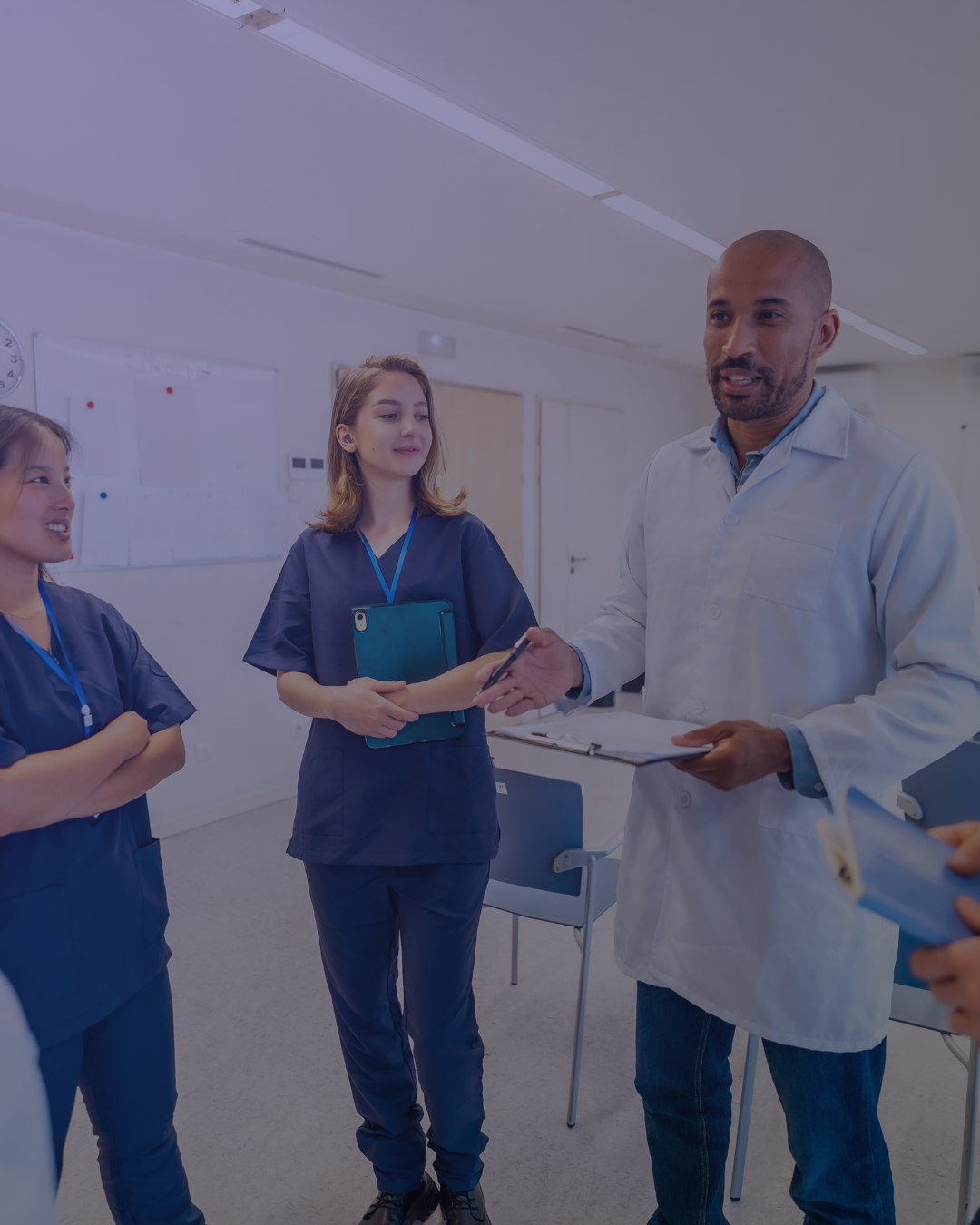 doctor in white coat leads a standup meeting