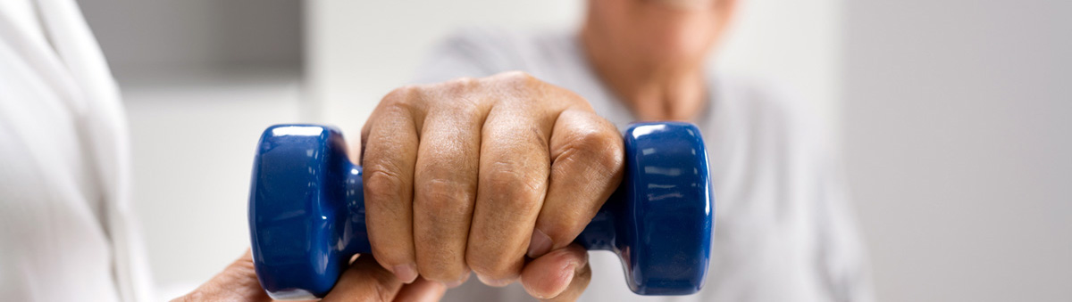 man with handweight