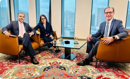 Sampson, Chopra, Zimmer in chairs at town hall