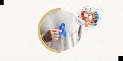person holding blue ribbon in front of their gut