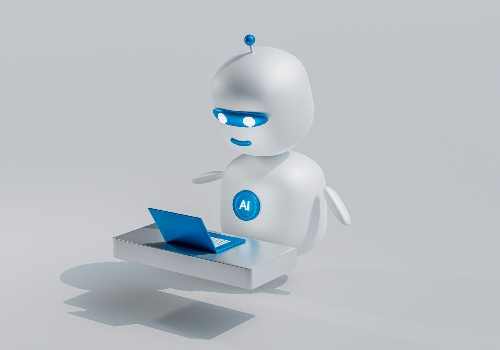 A cartoonish AI robot with blue accents stands before a laptop, symbolizing technology and artificial intelligence.