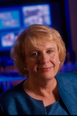 headshot of Marilyn Wolf in business casual blouse