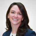 Brunette woman in blue blazer