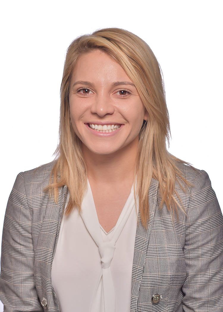 Professional photo of Ani Oganesyan, MD, smiling and wearing a gray blazer.