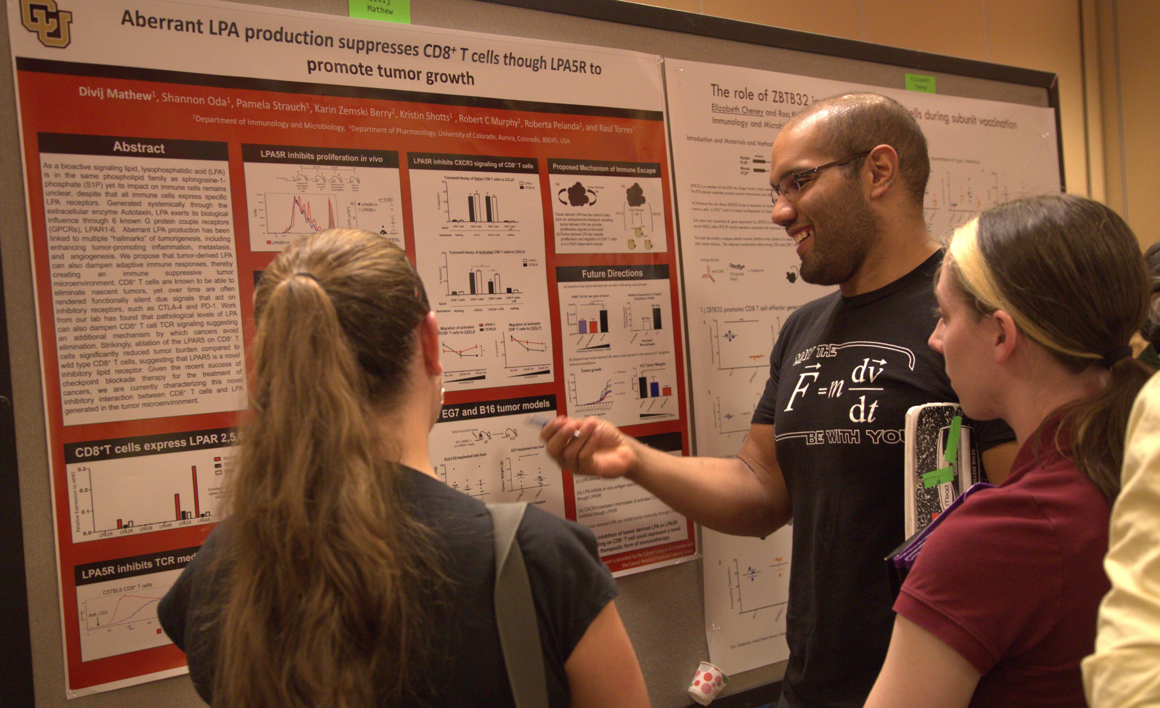 Dr. Divij Mathew presenting an abstract poster at the 2016 CIMC