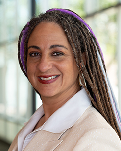 female smiling for a headshot