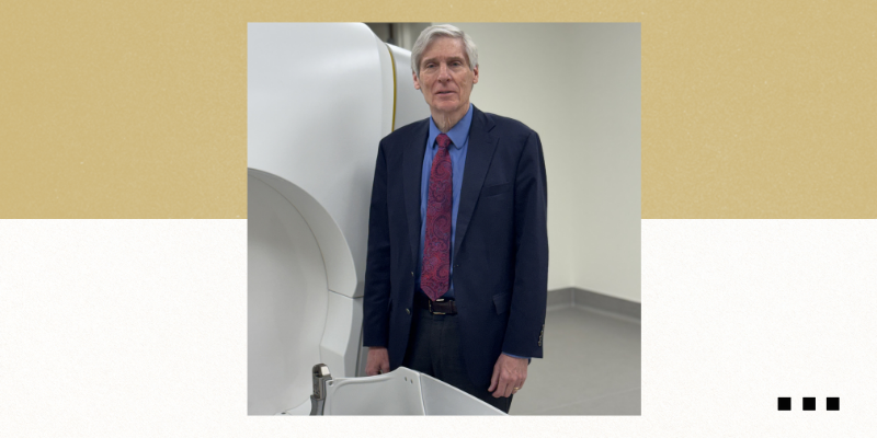 Robert Breeze, MD, standing in front of the Gamma Knife machine at UCHealth