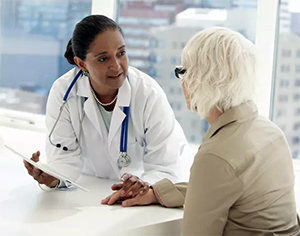 health worker comforts patient