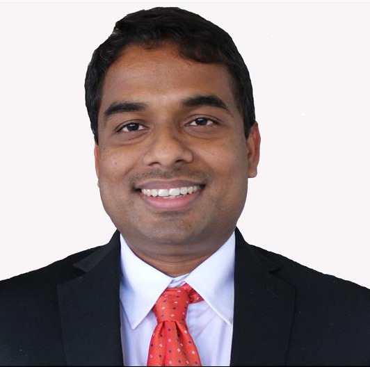 man smiling for a headshot