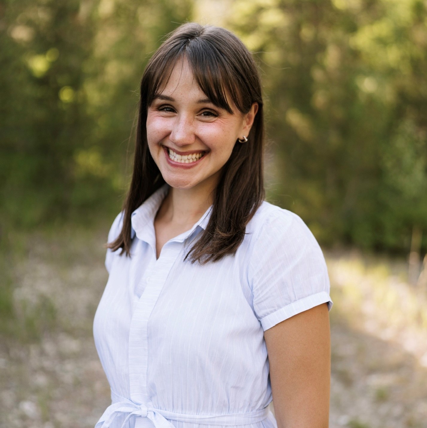 woman smiling outside