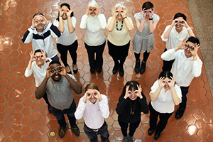 Cochrane group with hands as goggles