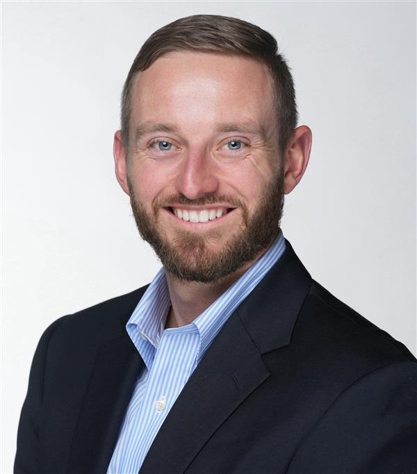 male white doctor in suite