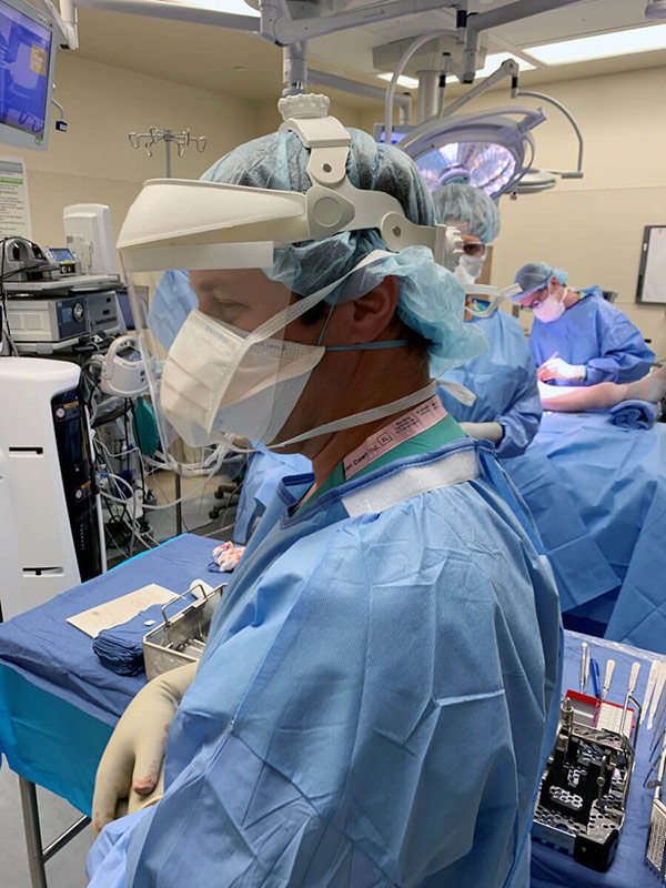 Covid-19, Dr. Jason Stoneback with added virus protection in the UCHealth University of Colorado Hospital 