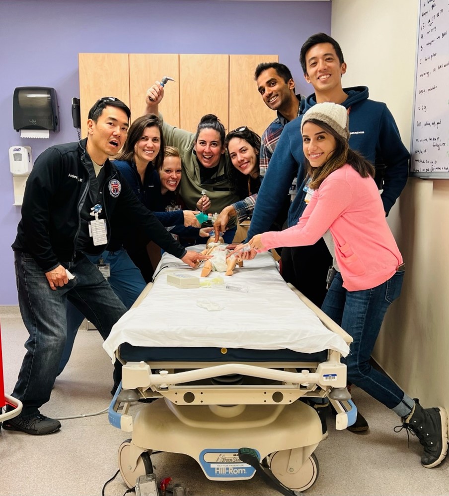 fellows posing during a simulation 