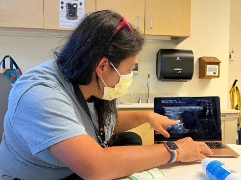 woman showing ultrasound