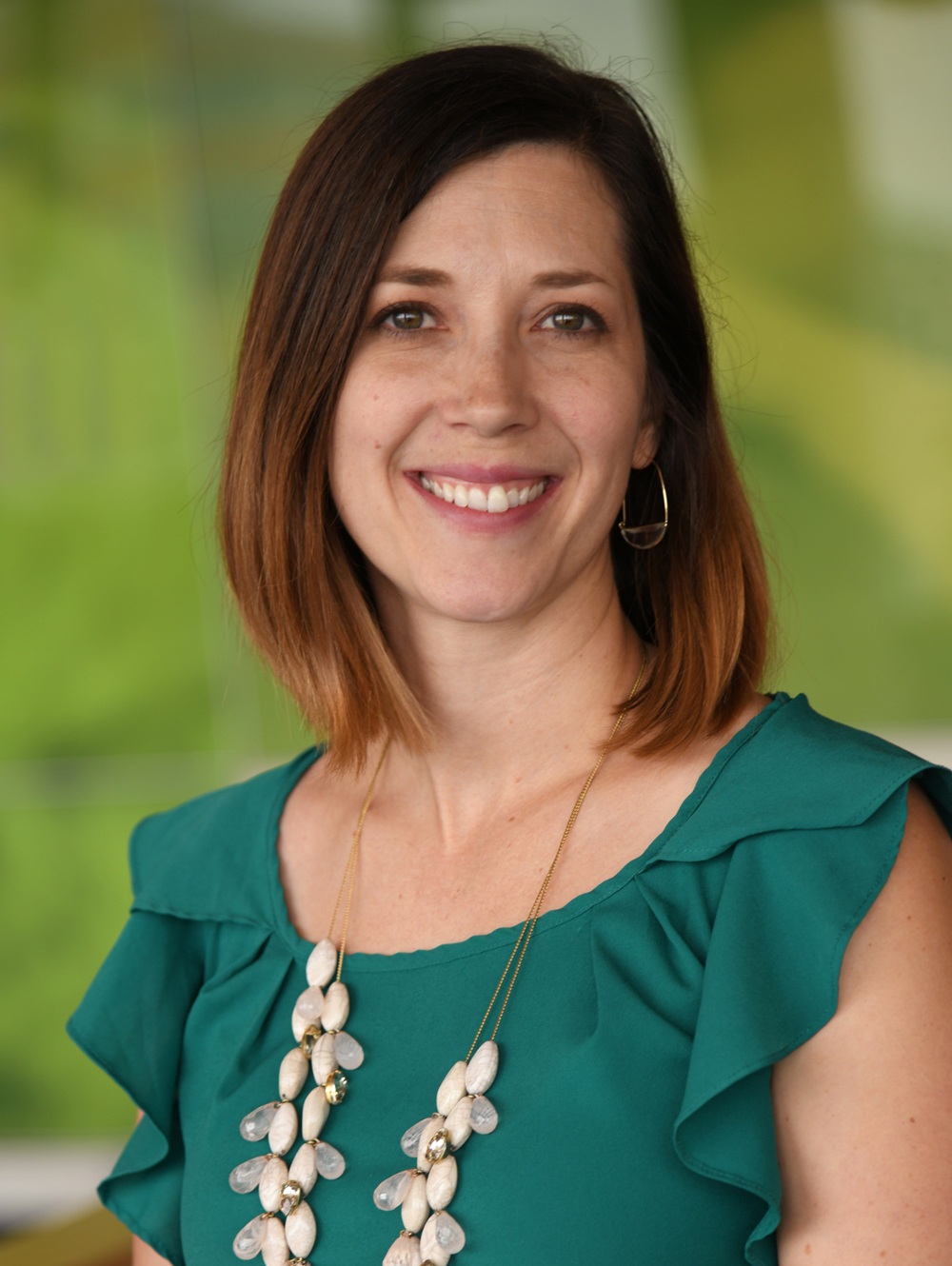 Dr. Tlustos-Carter headshot.