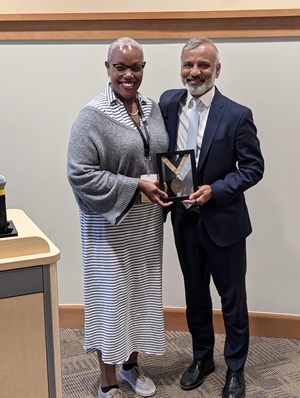 Dr. Saint-Phard's retirement recognition with Dr. Venu Akuthota.