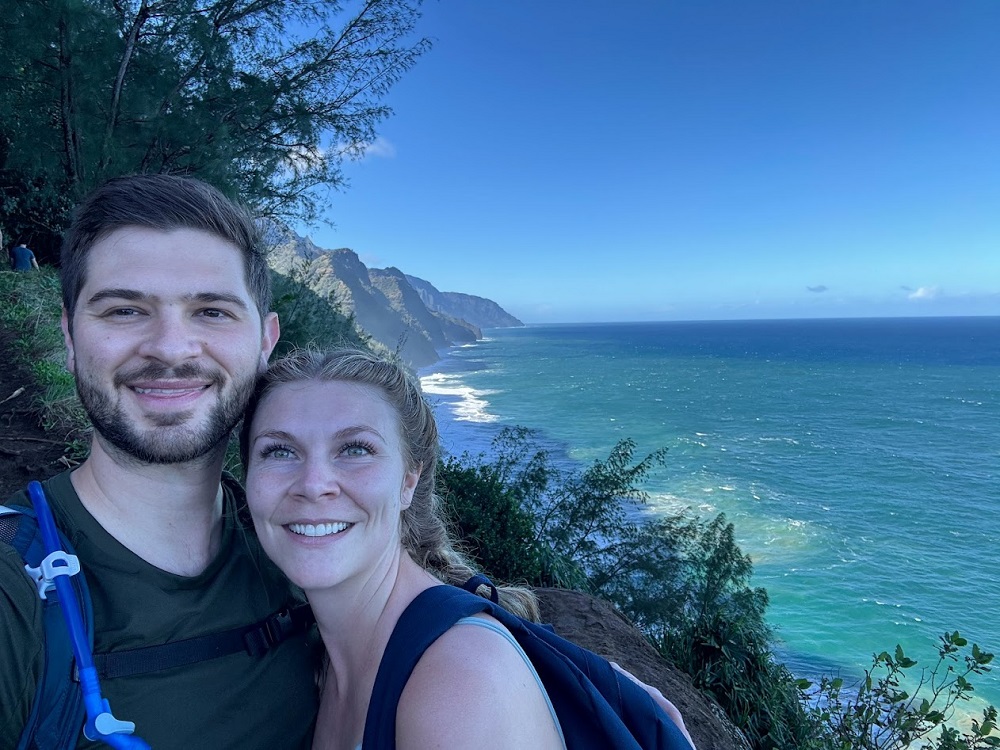Photo of Dr. Nicolosi with his wife near the ocean.