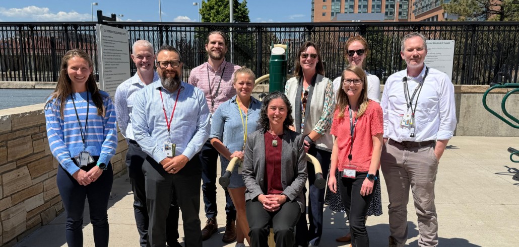 Dr. Stevens-Lapsley pictured with her team outside the VA.