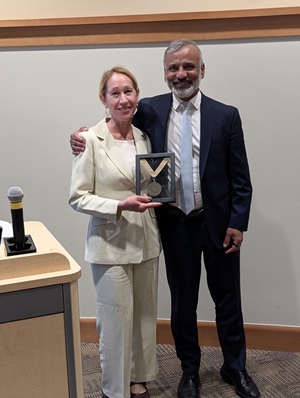 Dr. Heather Baer retirement recognition with Dr. Venu Akuthota.