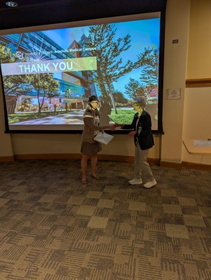 Dr. Hinrichs-Kinney receiving the PM&R Professionalism Award.