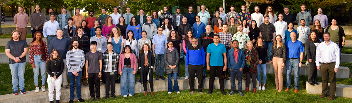 Shot of entire team standing on lawn