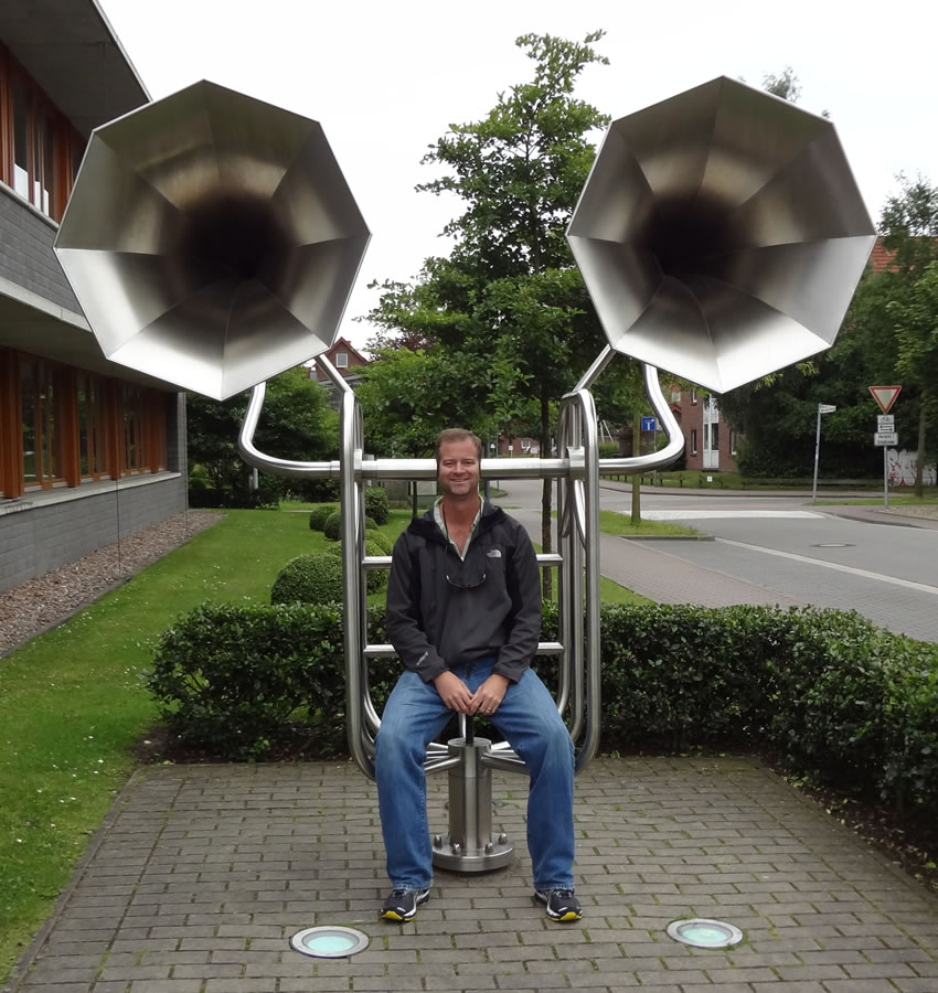 Dr. Tollin with giant mechanical ears -- 850 x 900