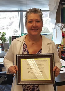 Kelley Brodsky receiving the Steven Fadul Award