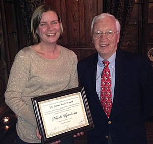 Nicole Spoelstra receiving the Steven Fadul Award