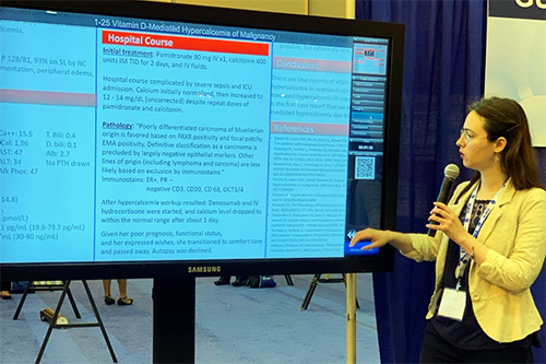 presentation by woman at screen