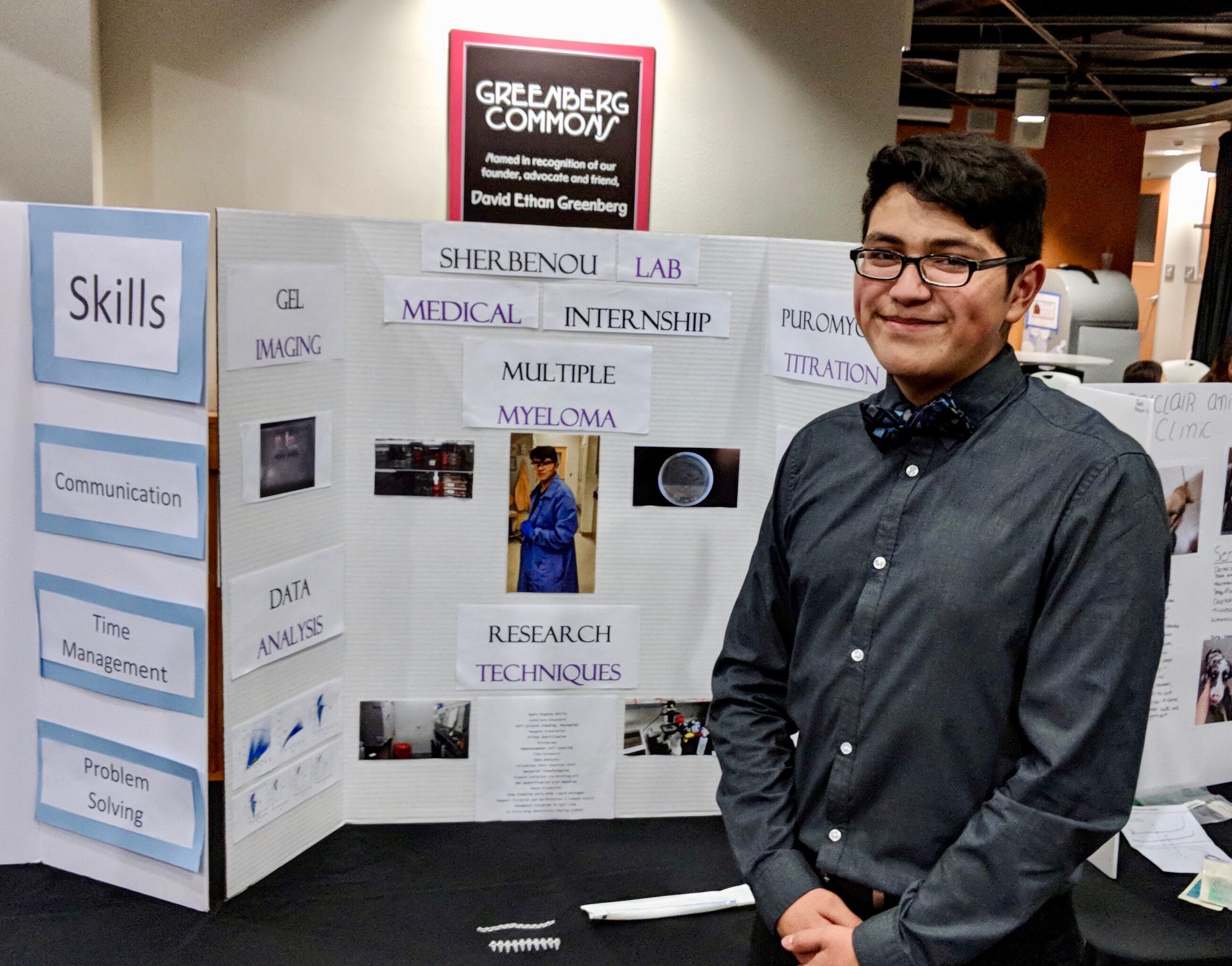 Andres with poster