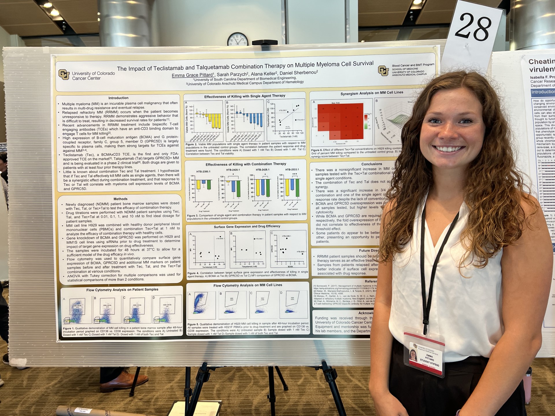 Student presenting research poster