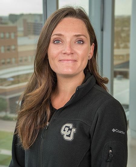 Headshot of woman with CU Sweater