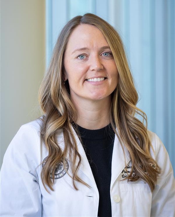 Headshot of woman in lab coat