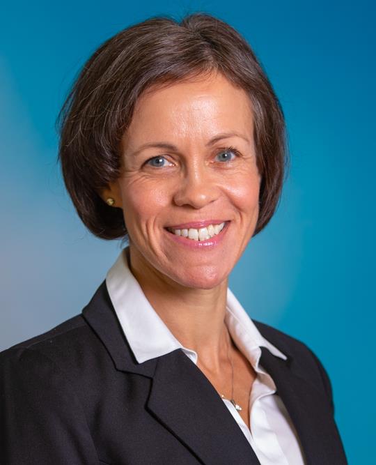 Headshot of woman in suit