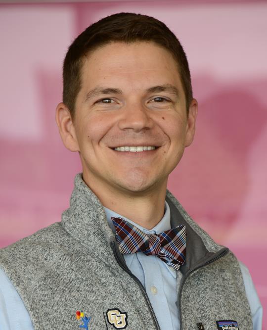 headshot of man in bowtie