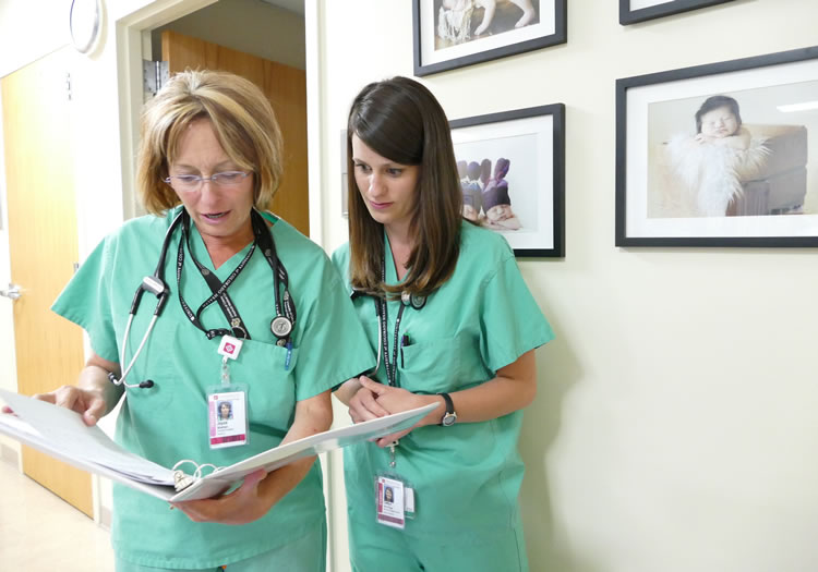 Preceptor mentoring a PA student in clinic