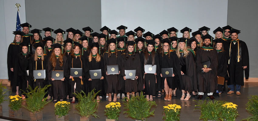 PA-program graduates in their caps and gowns