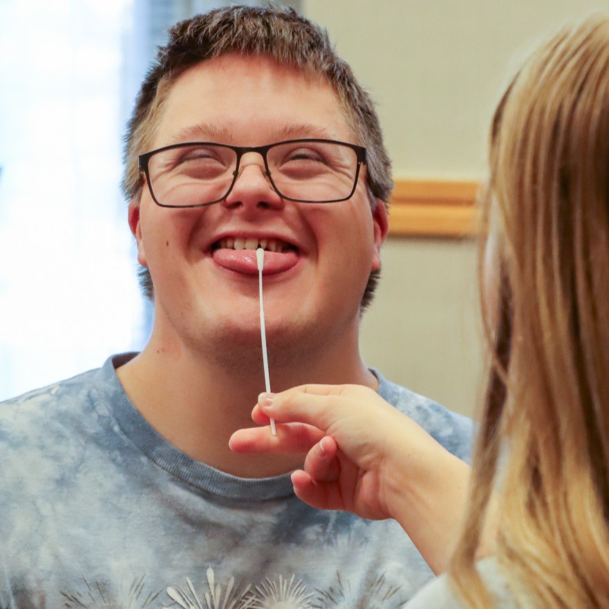 Participant getting his tongue swabbed for the HTP
