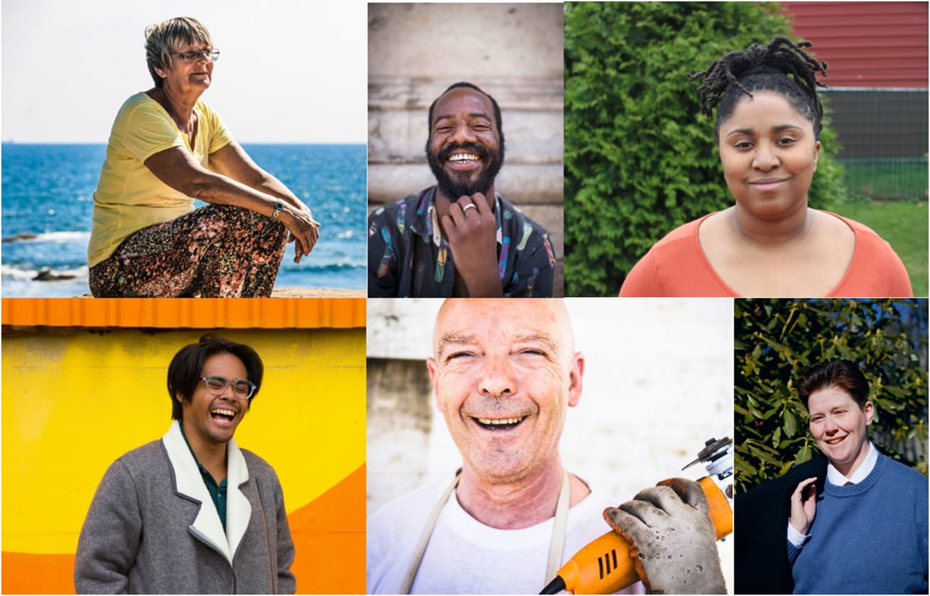 Various adults outside smiling